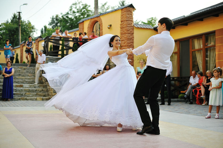 wedding dance lessons in a town square