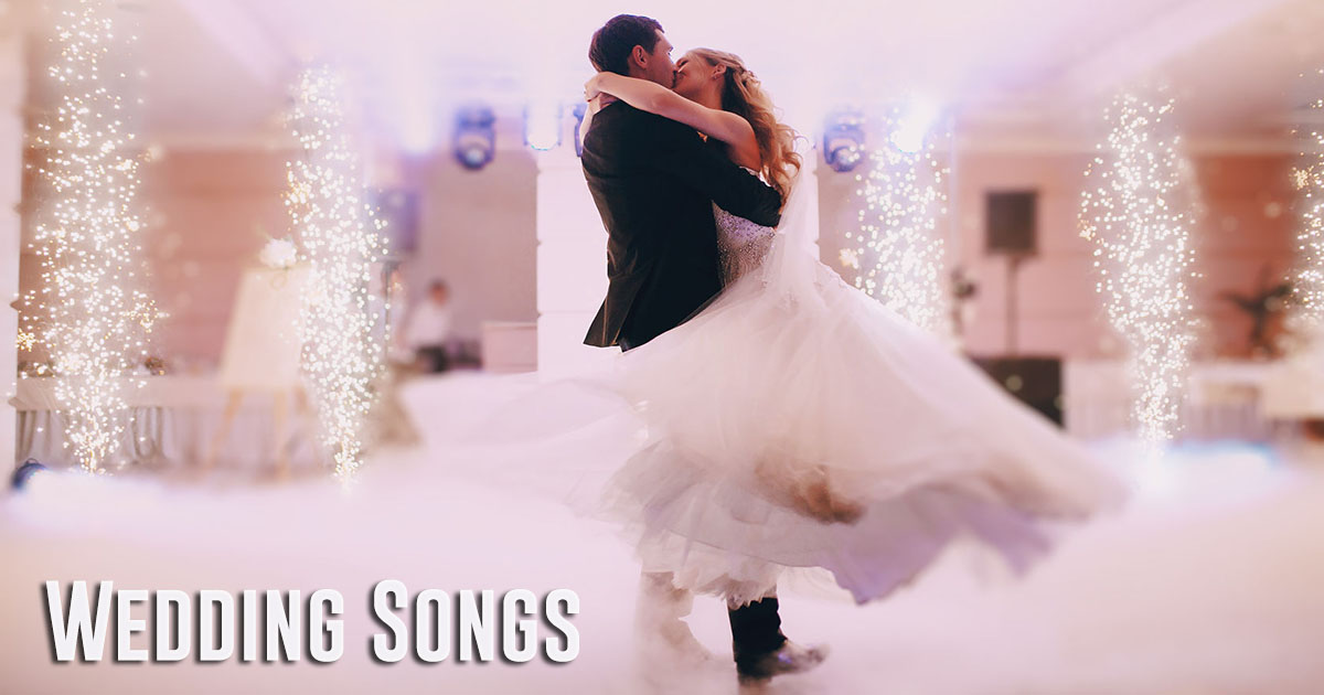 Couple dancing to wedding songs at reception